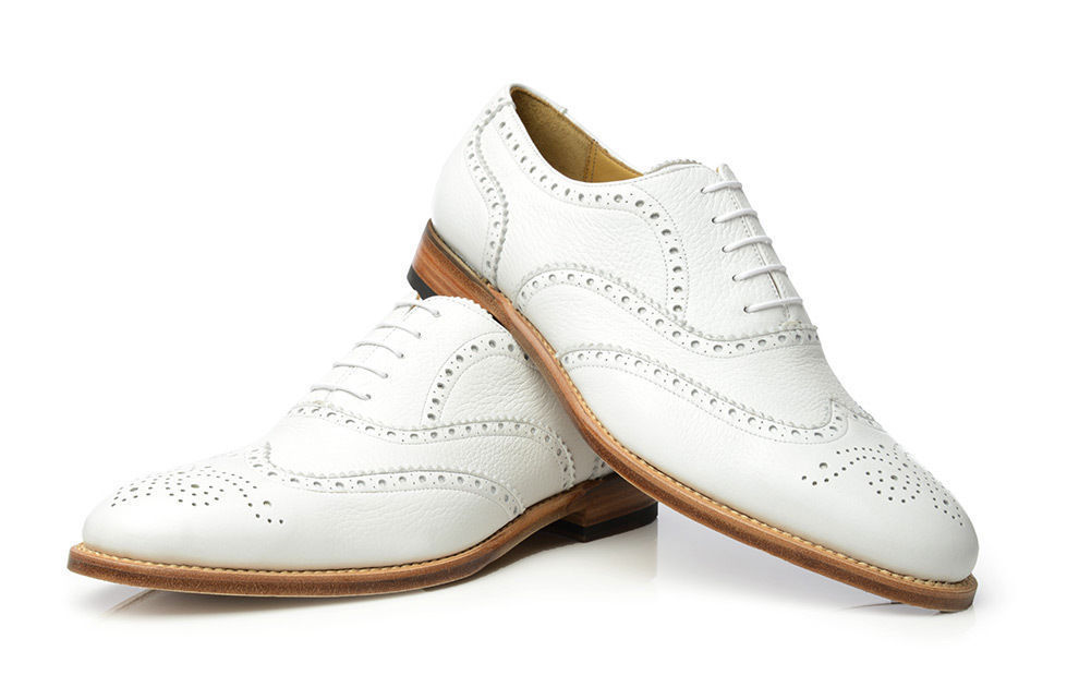 white wingtip shoes